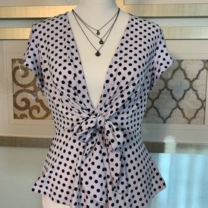 Polka dot tie front peplum top